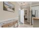 Inviting entryway with a decorative table, beach-themed artwork, and tile flooring at 4890 Luster Leaf Circle # 201, Myrtle Beach, SC 29577