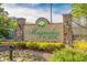 Beautiful Magnolia Pointe sign surrounded by blooming plants and flowers adding curb appeal to the neighborhood at 4890 Luster Leaf Circle # 201, Myrtle Beach, SC 29577