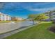 Stunning water view of apartments overlooking the lake with a fountain on a sunny day with blue skies at 4890 Luster Leaf Circle # 201, Myrtle Beach, SC 29577