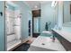 Stylish bathroom showcasing double sinks, walk-in shower, and modern design elements for a spa-like experience at 4900 N Ocean Blvd., Myrtle Beach, SC 29577