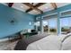 Bright, large main bedroom featuring wood beams, and direct access to a private balcony with ocean views at 4900 N Ocean Blvd., Myrtle Beach, SC 29577