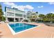 Stunning backyard featuring a large pool, wooden deck, and a beautifully designed home exterior at 4900 N Ocean Blvd., Myrtle Beach, SC 29577