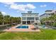 Stunning backyard with a private pool, lounge chairs, and a spacious deck perfect for outdoor entertaining at 4900 N Ocean Blvd., Myrtle Beach, SC 29577
