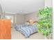Spare bedroom featuring two beds, a ceiling fan, and a large leafy plant at 503 20Th Ave. N # 15B, North Myrtle Beach, SC 29582
