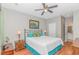 Comfortable bedroom with hardwood floors, neutral walls, and an ensuite bathroom, creating a relaxing retreat at 503 20Th Ave. N # 15B, North Myrtle Beach, SC 29582