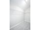 Simple walk-in closet with standard wire shelving and neutral carpeting at 5039 Selene Ct., Myrtle Beach, SC 29588
