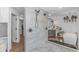 Open-concept bathroom with a tiled shower, soaking tub, and modern fixtures at 510 Rum Gully Rd., Murrells Inlet, SC 29576