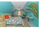 Bright, charming bedroom with tropical decor, surfboard accents, and vibrant color scheme at 510 Rum Gully Rd., Murrells Inlet, SC 29576