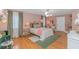 Stylish bedroom with soft lighting, hardwood floors, and cozy furnishings at 510 Rum Gully Rd., Murrells Inlet, SC 29576