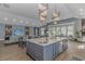 Large kitchen island with marble countertops and seating, ideal for entertaining at 510 Rum Gully Rd., Murrells Inlet, SC 29576