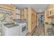 Practical laundry room with cabinetry, folding counter, and modern machines at 510 Rum Gully Rd., Murrells Inlet, SC 29576