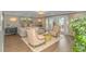 Well-decorated main bedroom with hardwood floors, outdoor access, and an ensuite bathroom at 510 Rum Gully Rd., Murrells Inlet, SC 29576