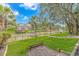 Expansive waterfront property with well-maintained lawn, mature trees, and waterfront views at 510 Rum Gully Rd., Murrells Inlet, SC 29576