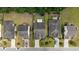 An aerial view showcases the property's location within a well-maintained neighborhood with manicured lawns and mature trees at 5149 Morning Frost Pl., Myrtle Beach, SC 29579