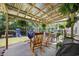 Charming backyard patio with a ceiling and a hammock, perfect for outdoor relaxation and entertainment at 5149 Morning Frost Pl., Myrtle Beach, SC 29579