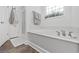 Relaxing bathroom features a soaking tub with a separate shower, creating a spa-like experience at 5149 Morning Frost Pl., Myrtle Beach, SC 29579