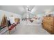 Bright bedroom with vaulted ceiling, ceiling fan, carpet, and plenty of room for both play and sleep at 5149 Morning Frost Pl., Myrtle Beach, SC 29579