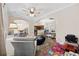 Open-concept living space seamlessly connects to dining and kitchen areas, creating an inviting atmosphere at 5149 Morning Frost Pl., Myrtle Beach, SC 29579