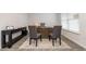 Well-appointed office space with dual chairs, modern desk, and stylish decor on hardwood floors at 555 Strawberry Field Way, Galivants Ferry, SC 29544