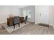 Bright office with hardwood floors, a large desk, and a view from the window at 555 Strawberry Field Way, Galivants Ferry, SC 29544