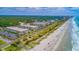 Scenic aerial shot of condos nestled along the beach, offering stunning ocean views at 5601 N Ocean Blvd. # C-314, Myrtle Beach, SC 29577