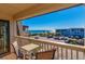 Inviting balcony view features seating overlooking the ocean and parking area for a serene outdoor experience at 5601 N Ocean Blvd. # C-314, Myrtle Beach, SC 29577