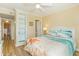 Comfortable bedroom featuring built-in shelves and beach-themed bedding, for a relaxing stay at 5601 N Ocean Blvd. # C-314, Myrtle Beach, SC 29577