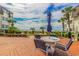 Inviting wooden deck features seating, an umbrella and beautiful ocean views at 5601 N Ocean Blvd. # C-314, Myrtle Beach, SC 29577