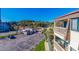 Scenic view from above showcasing the parking area and surrounding landscape of palm trees and building exterior at 5601 N Ocean Blvd. # C-314, Myrtle Beach, SC 29577