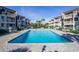 Refreshing community pool surrounded by lush landscaping and inviting lounge area at 5601 N Ocean Blvd. # C-314, Myrtle Beach, SC 29577