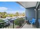 Balcony with outdoor seating and views of the parking and greenery at 5905 South Kings Hwy. # 132B, Myrtle Beach, SC 29575