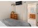 Bedroom featuring closet and tv with access to an en-suite bathroom at 5905 South Kings Hwy. # 132B, Myrtle Beach, SC 29575