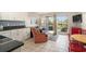 Living area flows to a balcony showcasing an open floor plan perfect for modern living and entertaining at 5905 South Kings Hwy. # 132B, Myrtle Beach, SC 29575
