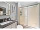 Bathroom with a large vanity, a toilet and a shower/bath with a sliding door at 6001 -6010 S Kings Highway, Myrtle Beach, SC 29575