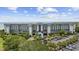 Beautiful multi-story condo building offers stunning ocean views with lush landscaping and ample parking at 601 Retreat Beach Circle # 213, Pawleys Island, SC 29585