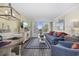 Cozy living room with comfortable seating, natural light, and stylish decor, perfect for relaxation at 601 Retreat Beach Circle # 213, Pawleys Island, SC 29585