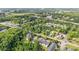 Overhead view of charming condos near lush trees and a river with a bridge nearby at 6016 Dick Pond Rd. # 109, Myrtle Beach, SC 29588