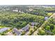 Scenic aerial view of condos surrounded by mature trees, close to a tranquil lake at 6016 Dick Pond Rd. # 109, Myrtle Beach, SC 29588
