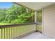 Screened-in balcony offering private outdoor space overlooking lush greenery at 6016 Dick Pond Rd. # 109, Myrtle Beach, SC 29588
