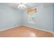 This is a cozy bedroom with a ceiling fan and a window at 6016 Dick Pond Rd. # 109, Myrtle Beach, SC 29588