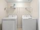 This is a laundry room with a washer and dryer at 6016 Dick Pond Rd. # 109, Myrtle Beach, SC 29588