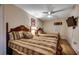 Bright bedroom with two beds, ceiling fan, and light wood flooring at 603 S Ocean Blvd. # 1205, North Myrtle Beach, SC 29582