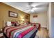 Cozy bedroom with two beds, ceiling fan, and light wood flooring at 603 S Ocean Blvd. # 1205, North Myrtle Beach, SC 29582