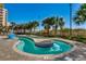 Relaxing lazy river with palm trees in an inviting outdoor area for resident's enjoyment at 603 S Ocean Blvd. # 1205, North Myrtle Beach, SC 29582