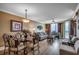 Spacious living room and dining area with hardwood floors, stylish decor, and ocean view at 603 S Ocean Blvd. # 1205, North Myrtle Beach, SC 29582