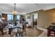 Open concept living area featuring dining area with bar seating and access to bedroom at 603 S Ocean Blvd. # 1205, North Myrtle Beach, SC 29582