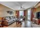 Comfortable living room with ocean view balcony access, stylish decor and furniture at 603 S Ocean Blvd. # 1205, North Myrtle Beach, SC 29582