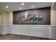 Elegant lobby with modern decor, featuring the building's name and stylish wall panels at 603 S Ocean Blvd. # 1205, North Myrtle Beach, SC 29582