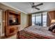 Comfortable main bedroom with ceiling fan and balcony access to ocean view at 603 S Ocean Blvd. # 1205, North Myrtle Beach, SC 29582