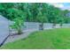 Serene backyard featuring a lush lawn, privacy fence and decorative stone landscaping at 617 Chiswick Dr., Conway, SC 29526